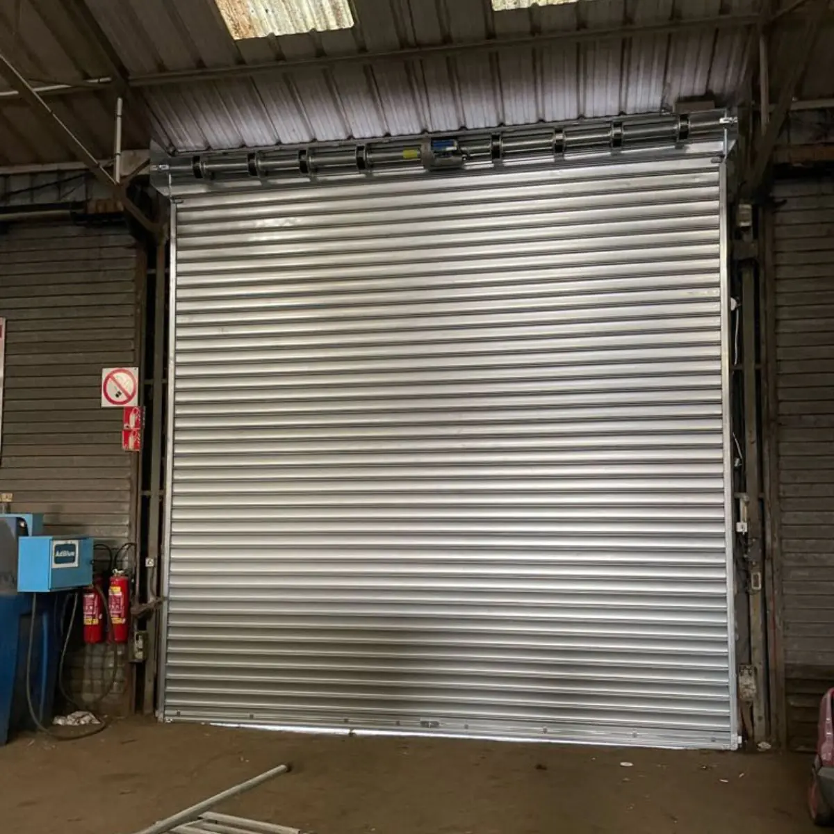 Entretien rideau métallique industriel