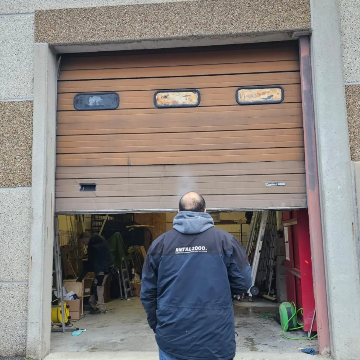 Mise en conformité de porte sectionnelle industrielle à Gennevilliers