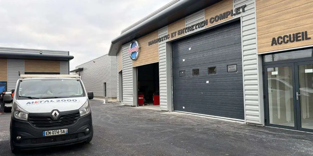 Entretien porte sectionnelle industrielle Maintenance 2000