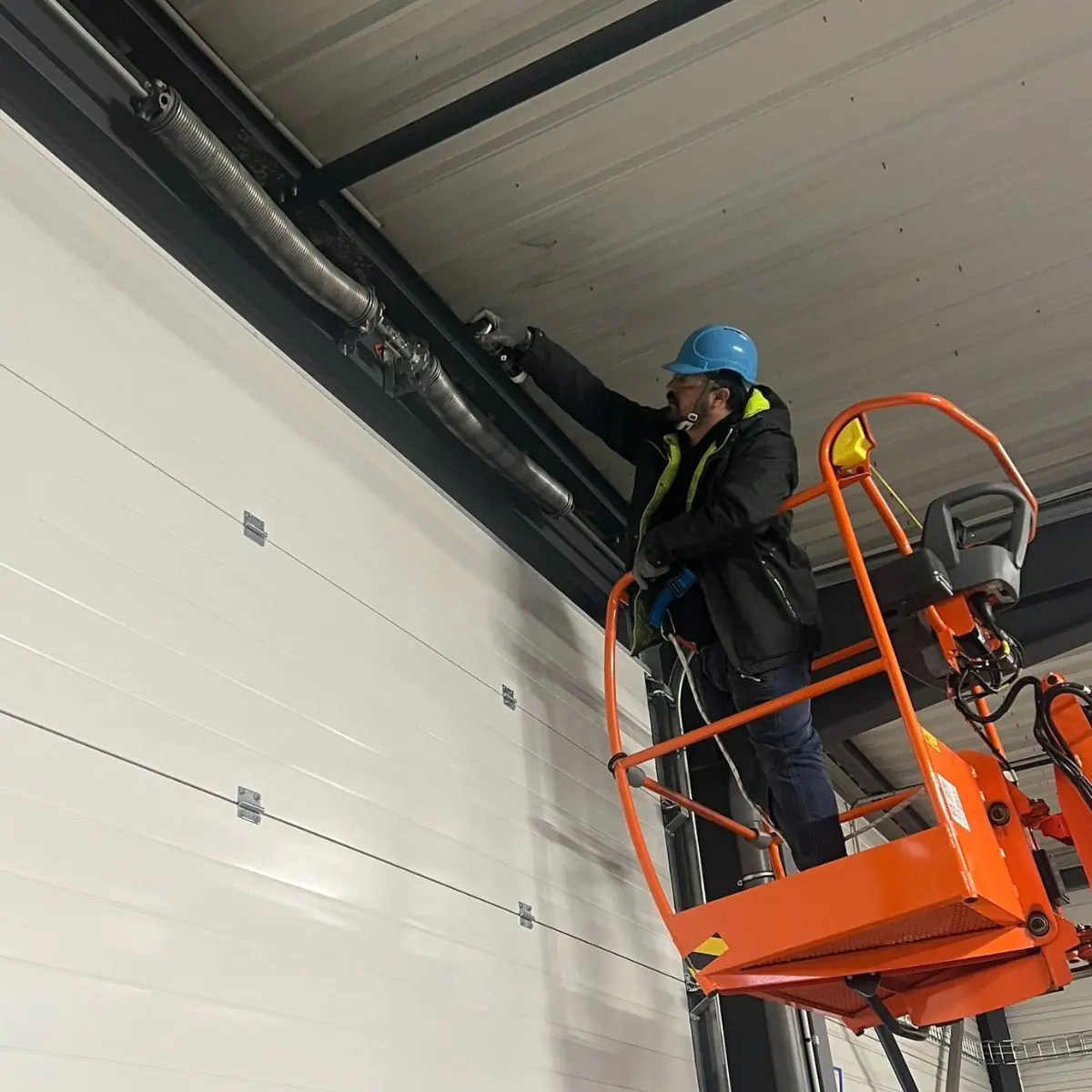 Maintenance porte sectionnelle industrielle