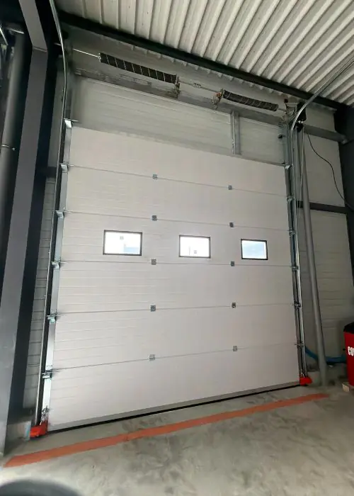 Maintenance porte sectionnelle industrielle 77