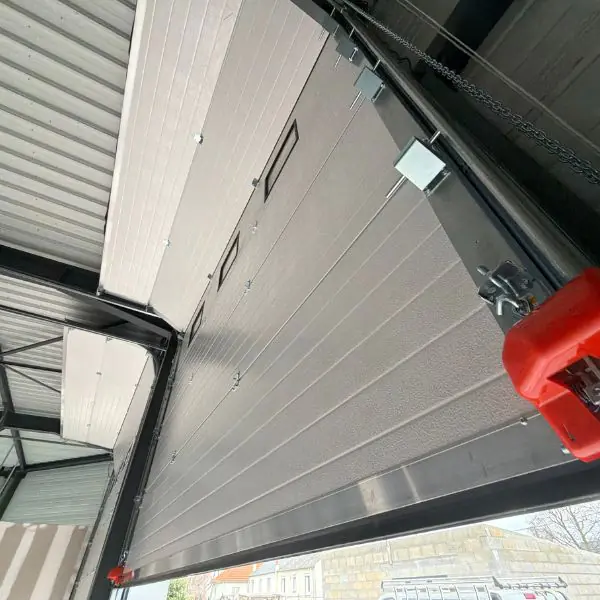 Maintenance porte sectionnelle industrielle 77