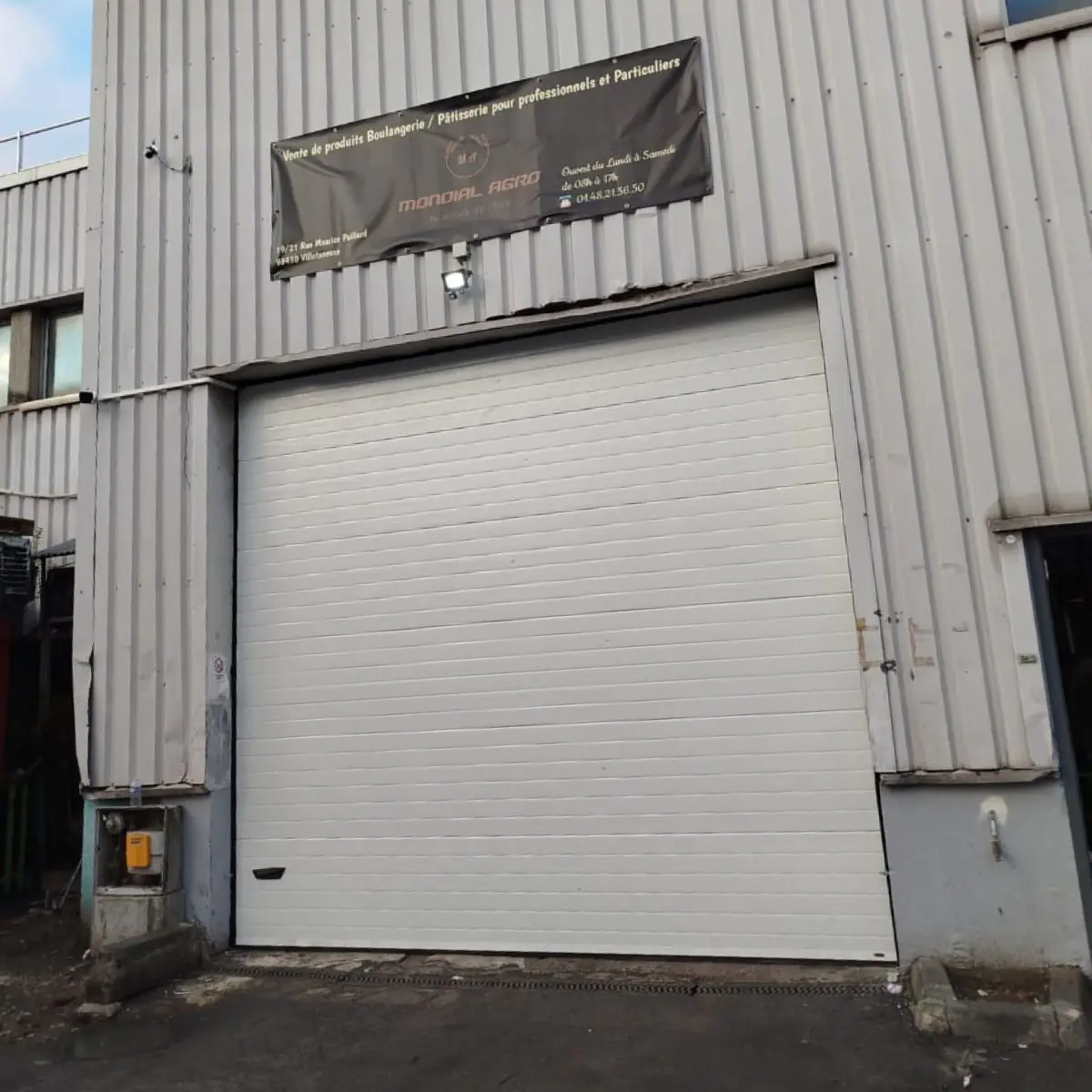 Entretien porte sectionnelle industrielle Val de Marne